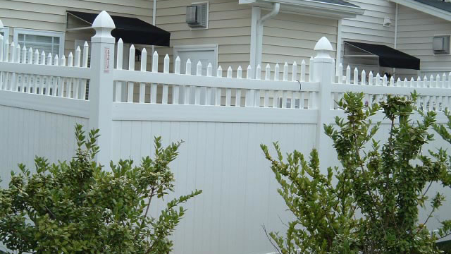 Vinyl Privacy with scalloped spindles Cary residential fence
