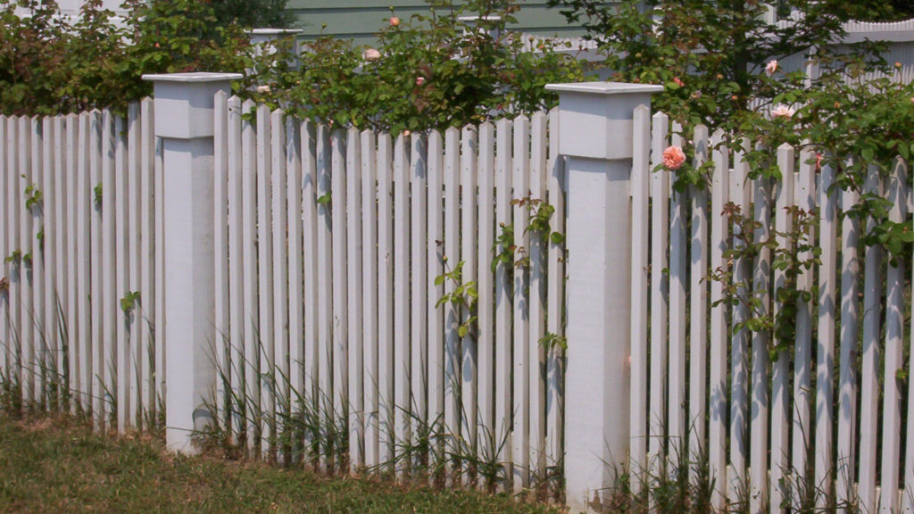 Wood 2x2 scalloped Cary residential fence